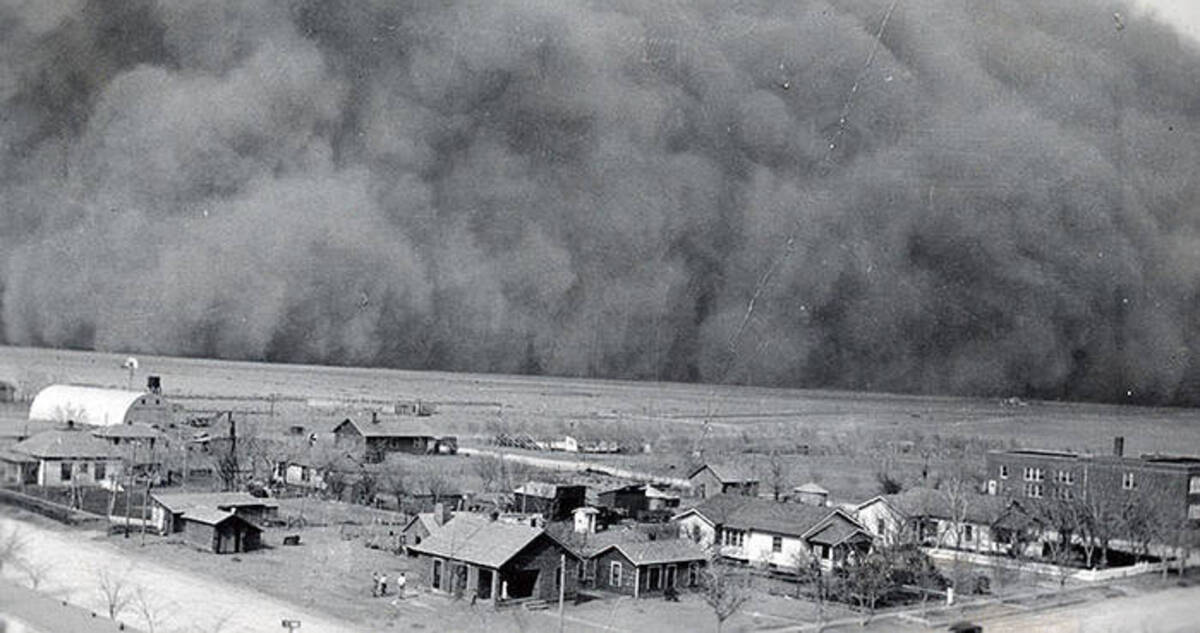 black blizzard rolling into a dust bowl farm